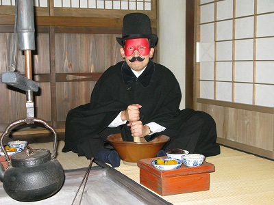 すりこぎをする怪人れきはく